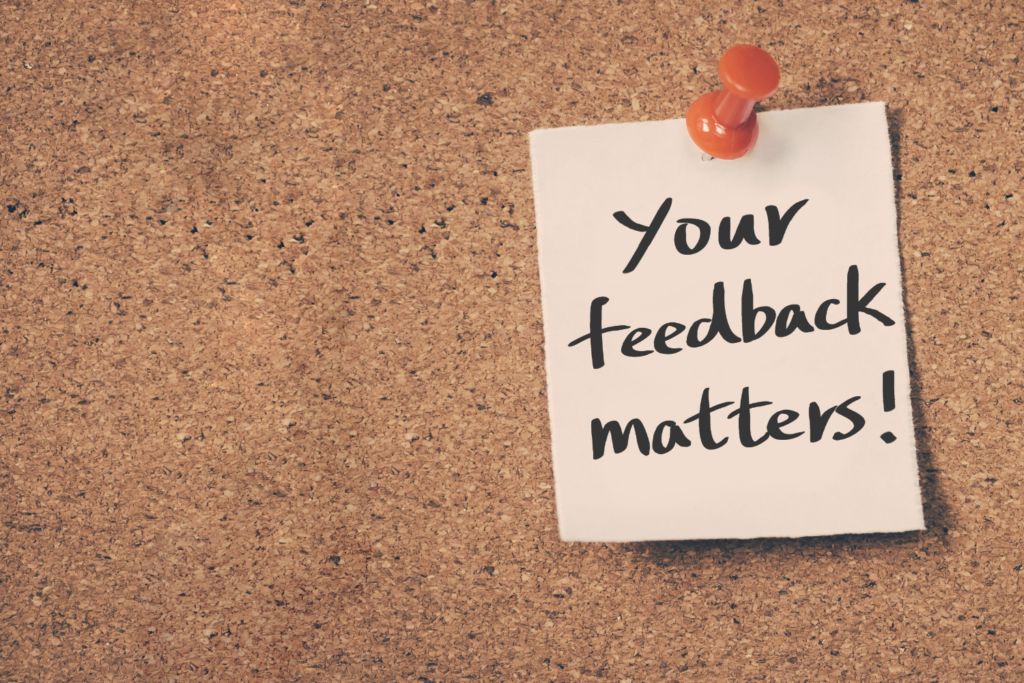 This is a photo of a post it note stuck to a bulletin board with the message Your Feedback Matters on it. CCD has launched a new feedback page for clients and care partners to let us know how we are doing.